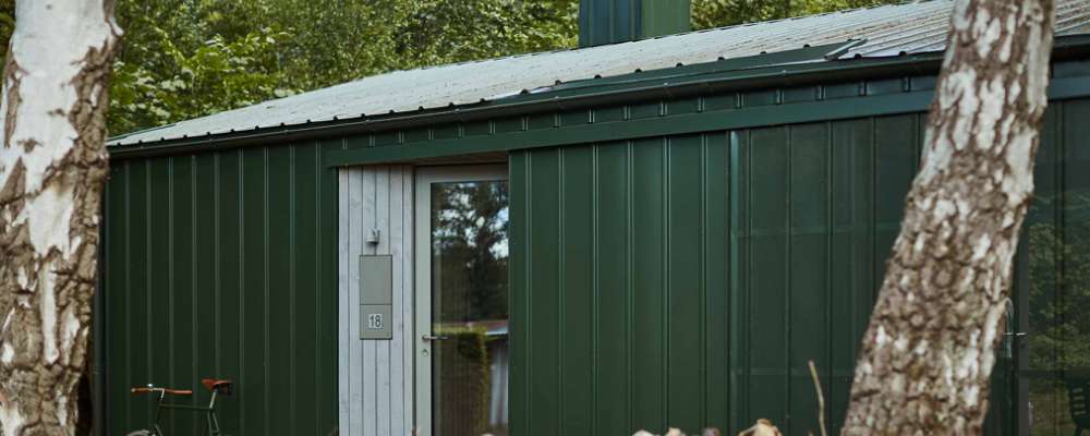 Reference architect Lotte Foght-Sørensen and green steel plates